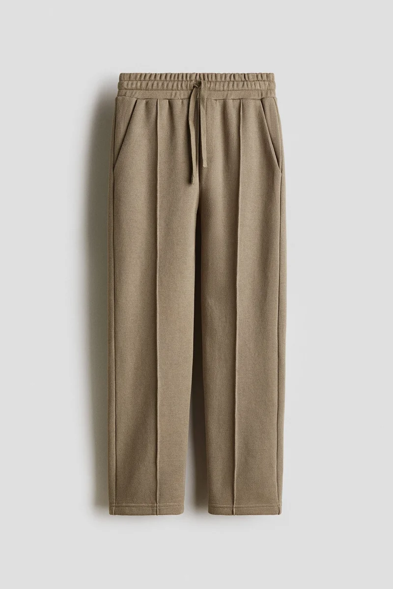 H&M Tapered piqué trousers