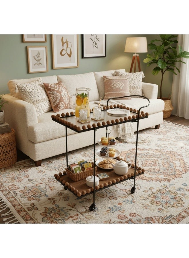 ICON This is a rectangular serving cart with wheels made of black metal and wood.This is a rectangular serving cart with wheels made of black metal and wood. - Image 1