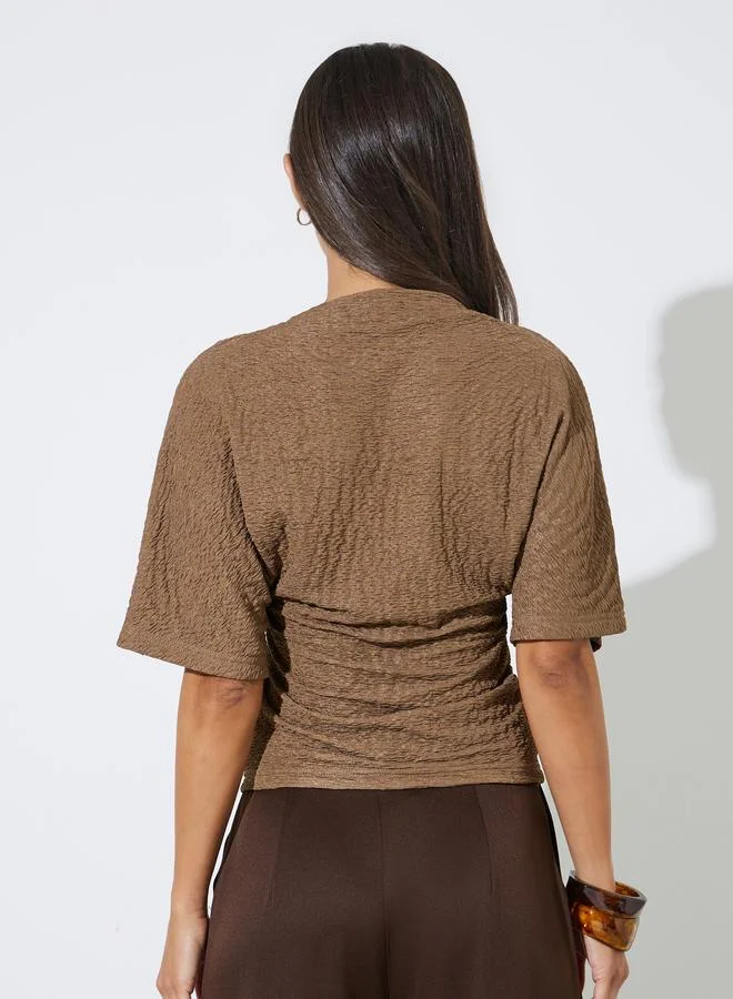 Styli  Brown Solid Knit Short Sleeve High Neck Top for Women | Best Price UAE