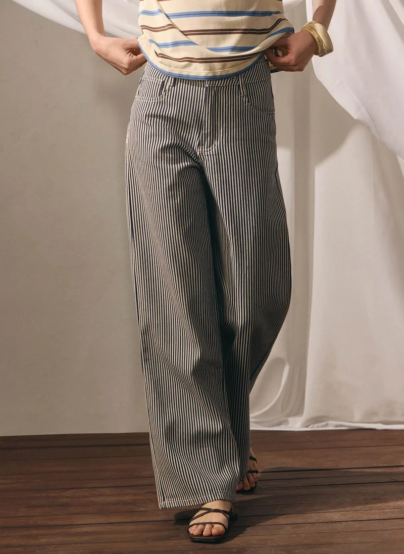 Relaxed striped jeans with waist ties