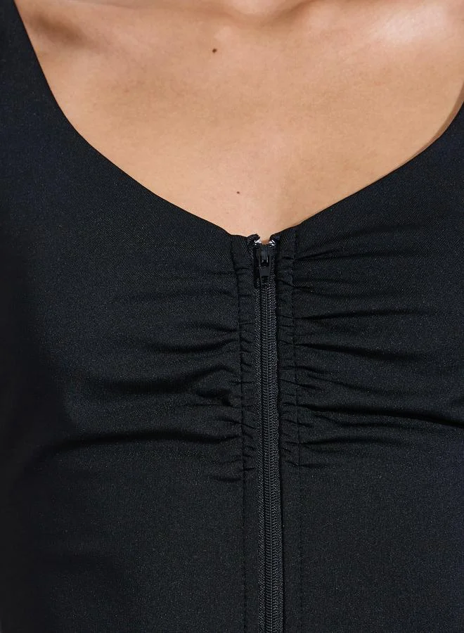 Styli Active  Black Solid Zip-Up Low Back Strappy Active Unitard for Women | Best Price UAE