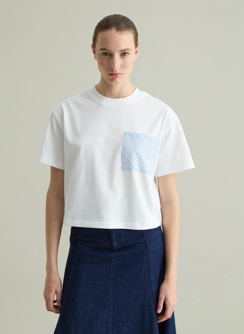 او في اس Optical White