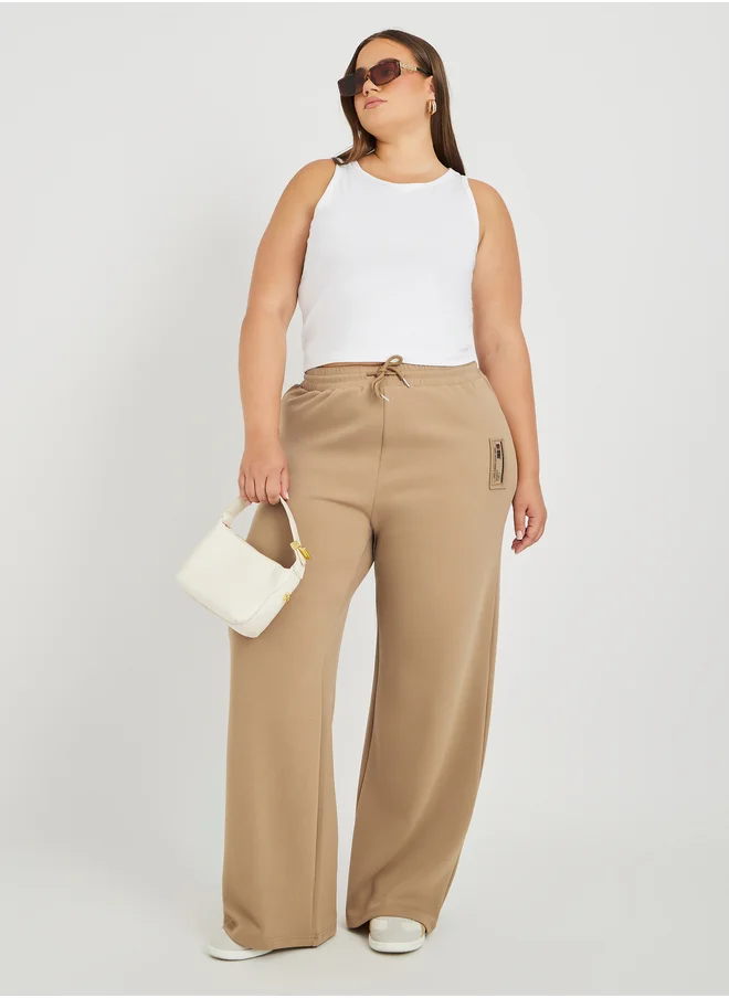 Styli Styli Plus Size Wide Leg Joggers with Drawstring