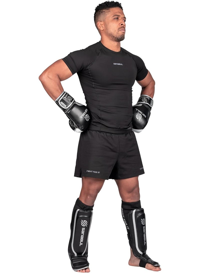 سنابول واقيات قصبة الساق الأساسية لرياضة الكيك بوكسينغ | واقيات قصبة الساق لرياضة فنون القتال المختلطة | واقيات قصبة الساق للمواي تاي | تصميم من النيوبرين الهجين، أسود/فضي - Image 2