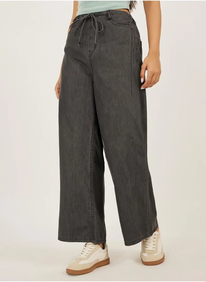 ستايلي Styli Mid Rise Plain Wide Leg Jeans with Drawstring Waist
