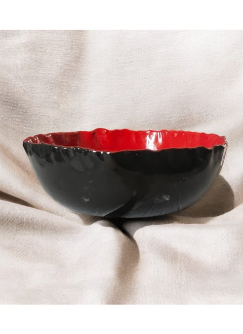 A ceramic and porcelain tray that can withstand direct and indirect heat, from a flame or inside the oven.