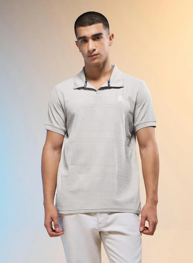 تكنوسبورت تيشيرت بولو رجالي بقصة ضيقة بنقشة الجاكار من تكنوسبورت