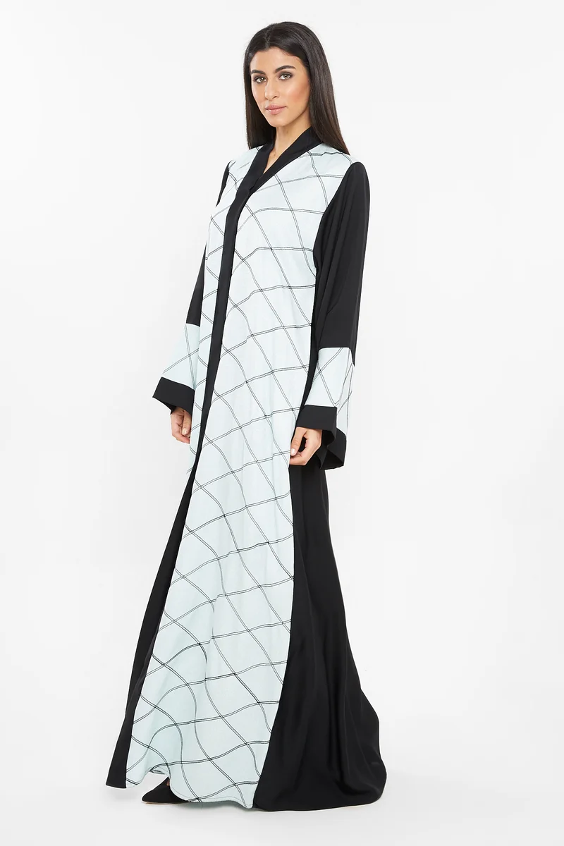 NUKHBAA A pastal blue abaya with square patterned embroidery detail.-AJ113A
