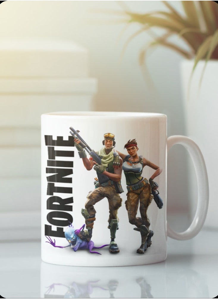 حكاية شمعة مج من السيراميك بطبعة تصميم "فورتنايت" بلون أبيض  - Image 1