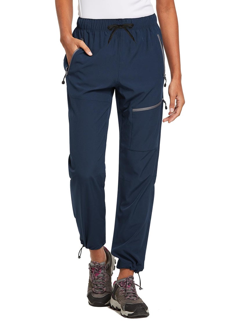 Baleaf بنطلون بلييف النسائي للمشي الصغير خفيف الوزن سريع الجفاف مقاوم للماء بنطلون كارغو بطول 27 بوصة لجميع الفصول باللون الأزرق البحري مقاس M - Image 1