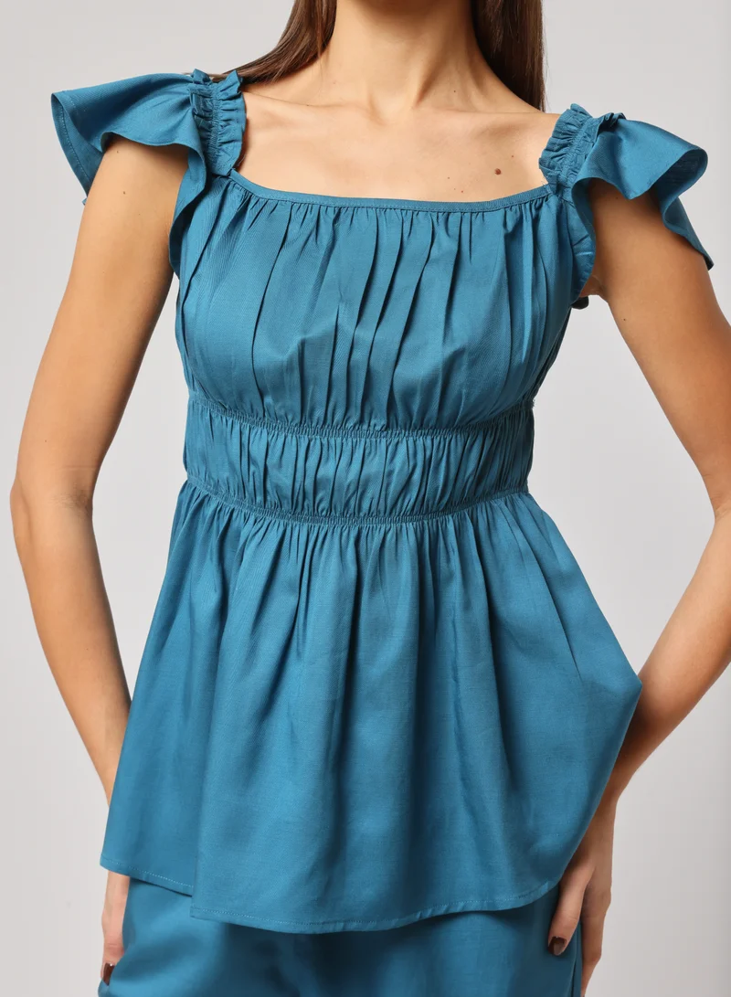 أشيتا فرنانديز Ashita Fernandes Nad Ki Kahani Top for Women – Gathered Neckline Top with Ruffle Sleeves & Peplum Waist | Straight-Leg Pants with Elastic Waistband & Deep Pockets | Premium Linen Blend Comfort & Style, Blue Colour