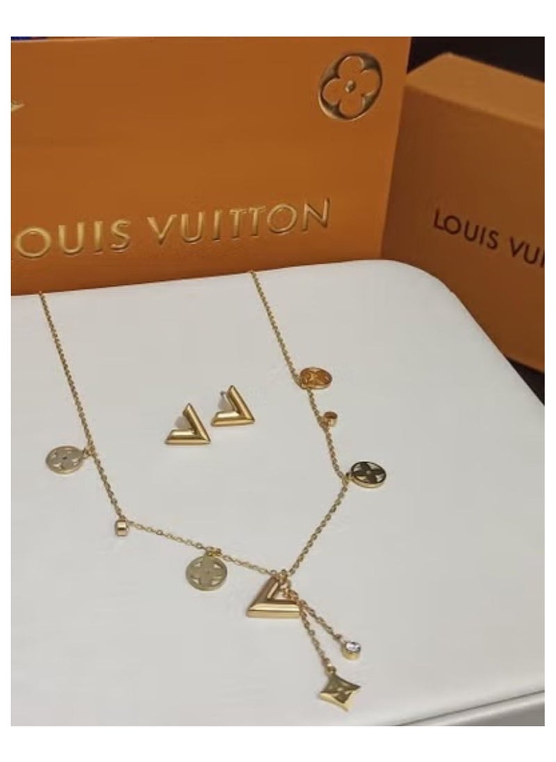 Lo Gold necklace and earring set with accessories and warranty card 