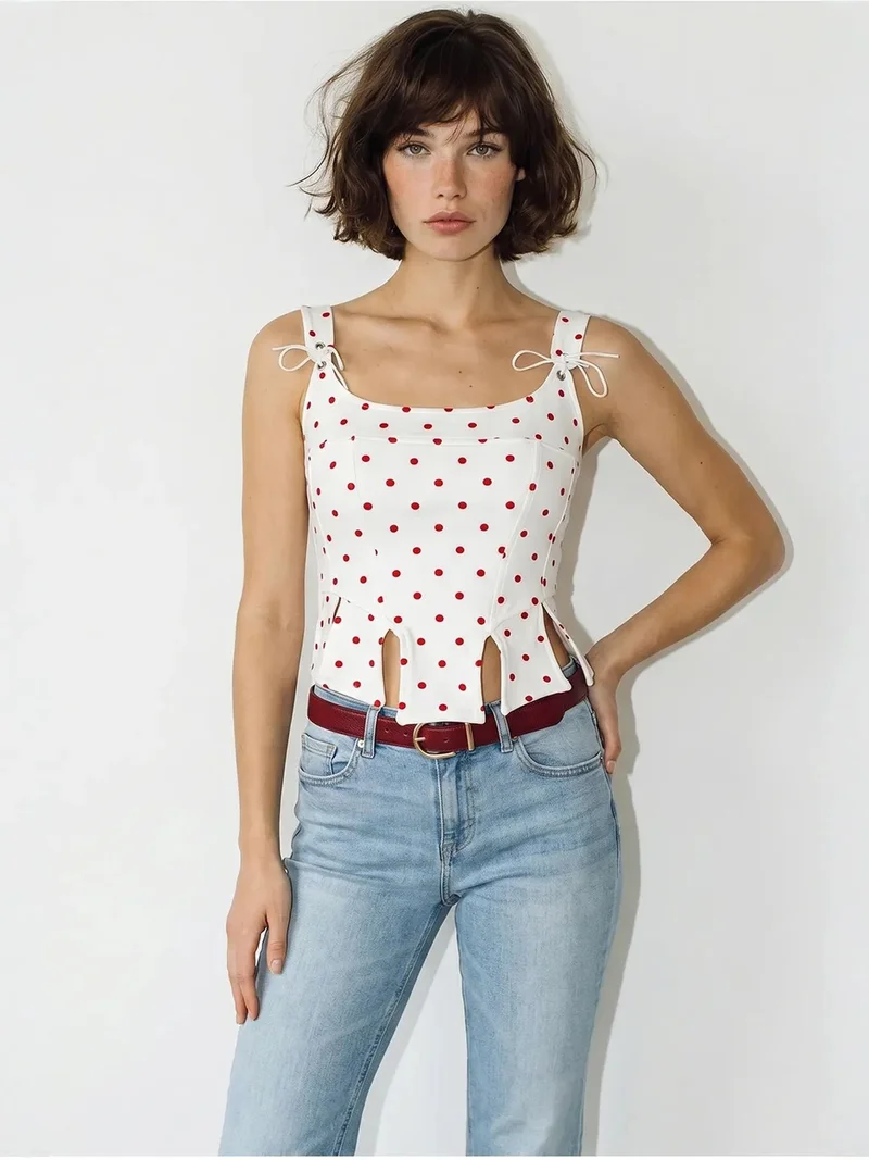 بيانكو لوتشي LUCCI Women's Cropped Polka Dot Corset Top