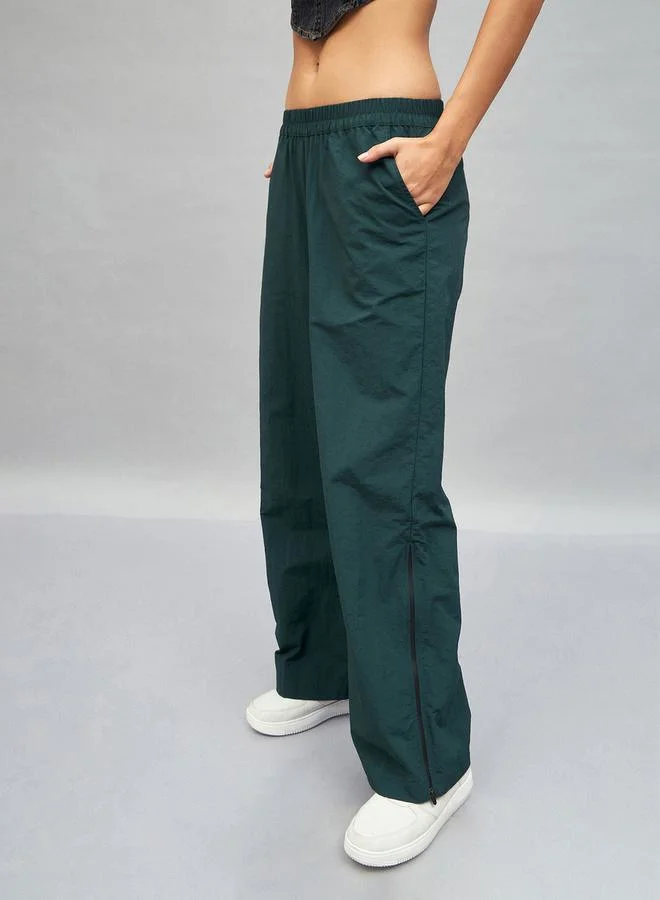 SASSAFRAS Seam Zipper Parachute Pants with Pockets by Styli
