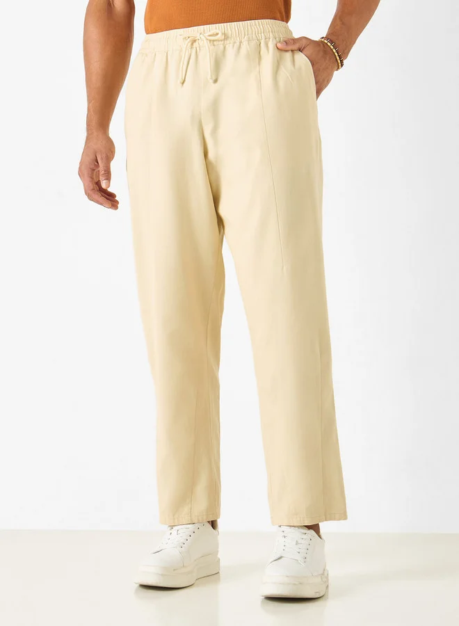 ايكونيك بنطلون رياضي سادة بخصر مرن وقصة مريحة مع رباط إغلاق وجيوب