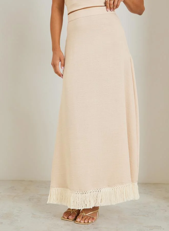 Styli Women Beige A-Line Maxi Skirt with Fringe Hem