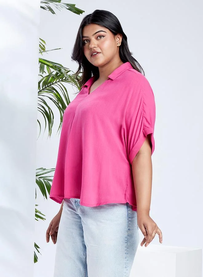 جلو باص بلوزة بمقاس كبير وأكمام قصيرة