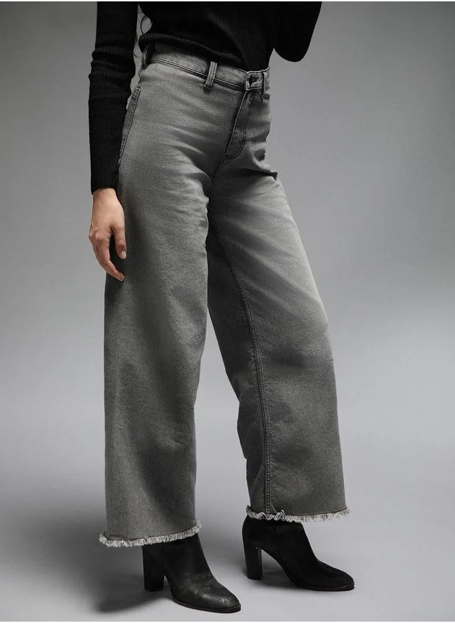 هاي ستار High Star High Rise Faded Flared Jeans with Raw Edge Hem