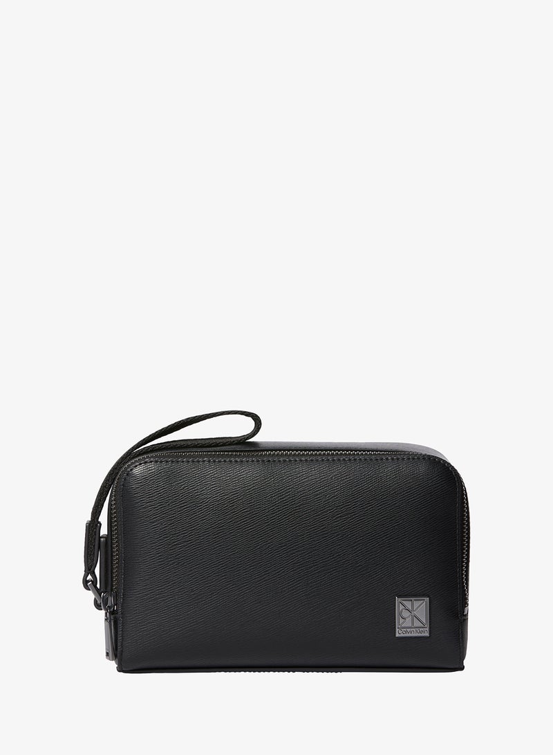 CALVIN KLEIN Emblem Hardware Bracelet Strap Washbag - Image 1