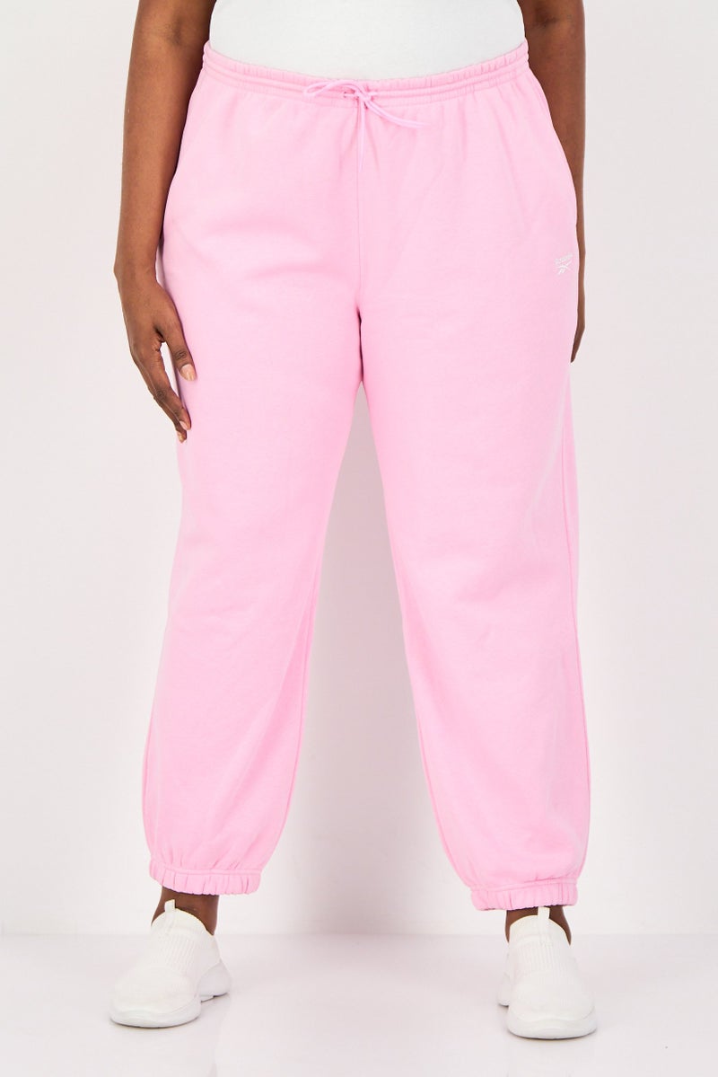 Reebok سروال جوجر خارجي للنساء بمقاسات كبيرة، وردي - Image 1