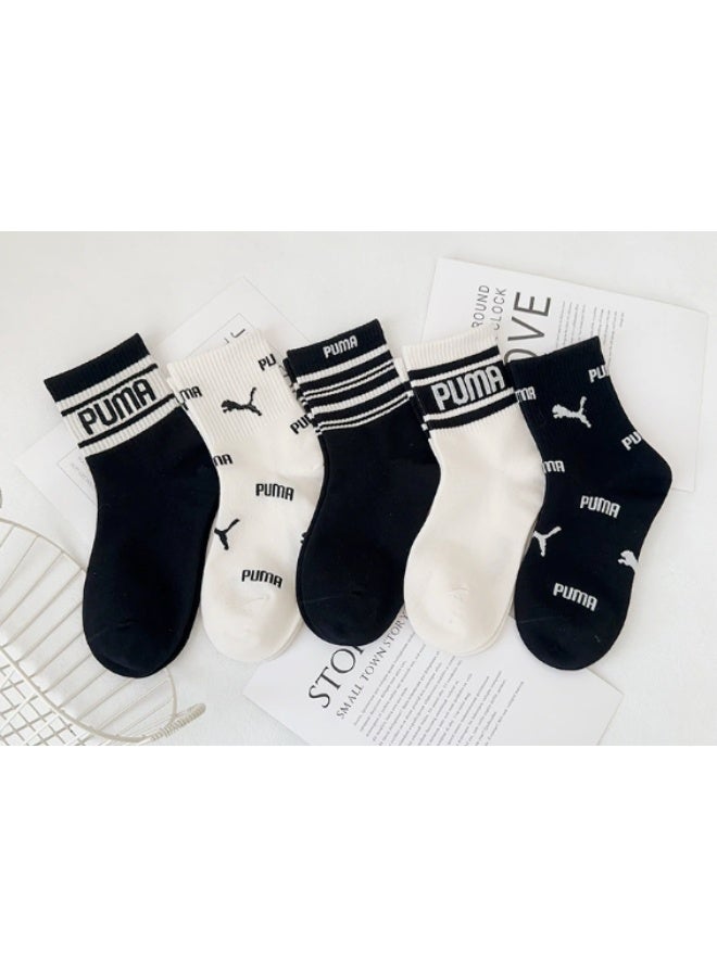 5 pairs of unisex children's socks (2 white + 3 black , suitable for ages 5-7)