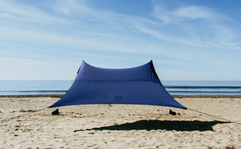 Neso Gigante Portable Beach Tent Sun Shelter - Lightweight Beach Shade Canopy - Easy Setup for Family Outings - Patented Reinforced Corners - UPF 50+ Sun Protection - 8ft Tall, 11 x 11ft - Navy - Image 1