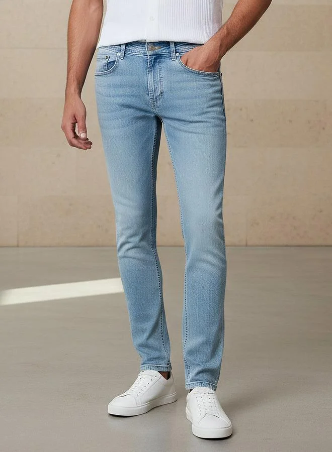 سبلاش فيڤ جينز رجالي بقصة ضيقة وخصر مرن وجيوب