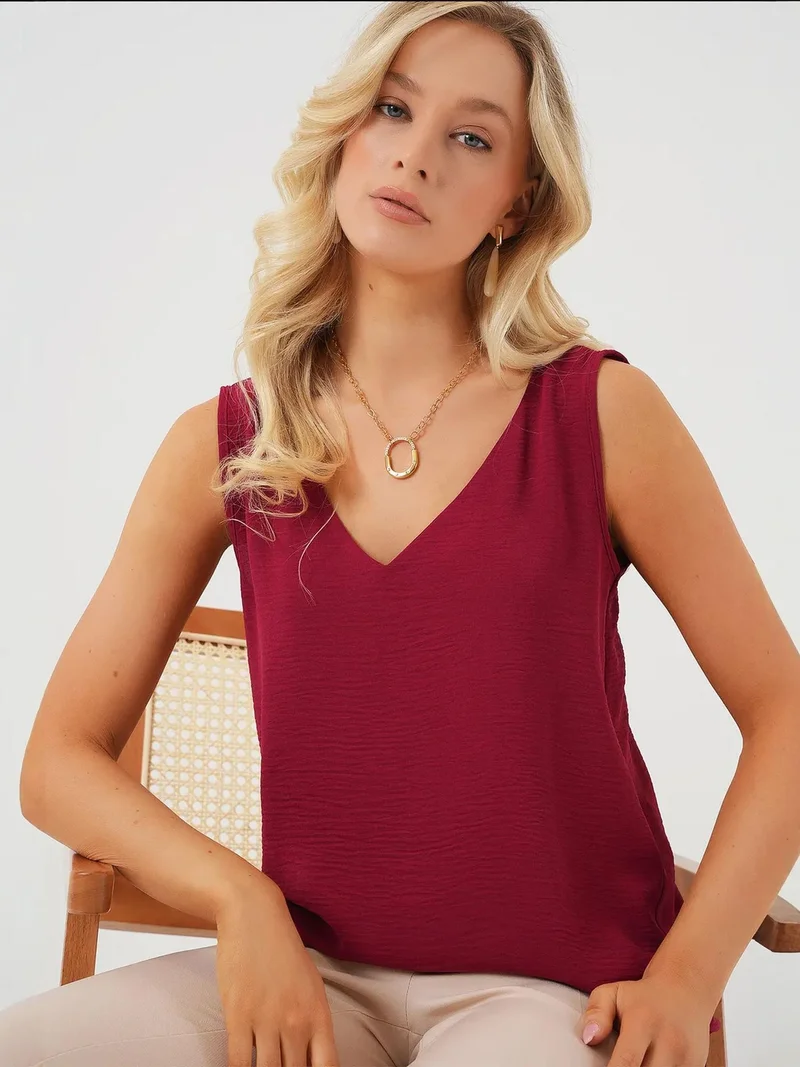 بيغ دارت بلوزة بياقة على شكل حرف  من