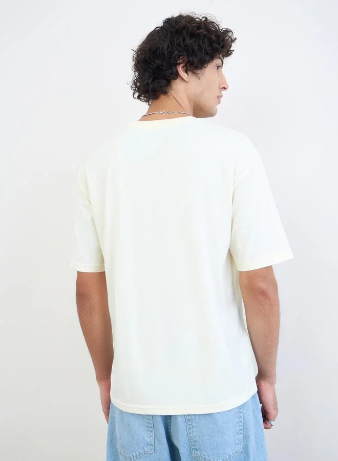 Styli Cream Men Text Print Oversized Jersey T-Shirt for Men | Best Price UAE