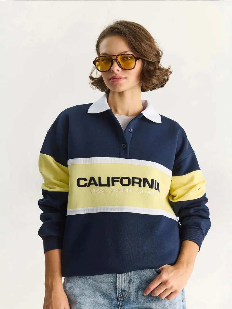 Bianco Lucci LUCCI Oversized Printed Polo Collar Sweatshirt