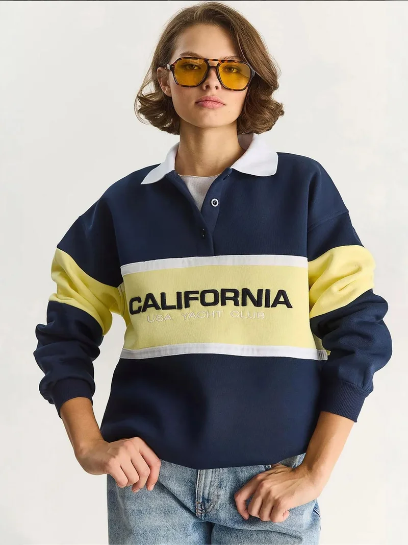 Bianco Lucci LUCCI Oversized Printed Polo Collar Sweatshirt