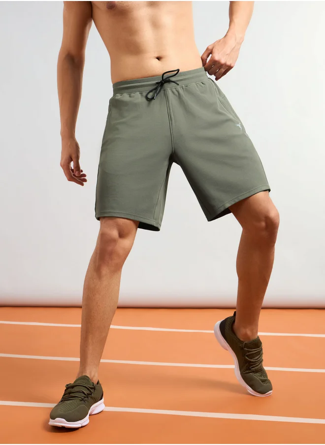 تكنوسبورت Men Solid Slim Fit  Shorts with TS Flexi