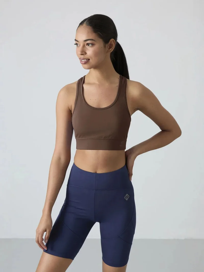 تومي لايف TOMMY Sleeveless Cropped Fitted Sports Top
