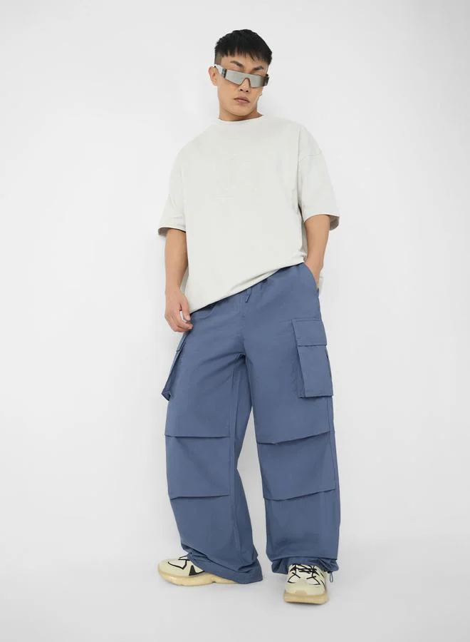 ذا سوليد ستور بنطال باراشوت بجيوب كارجو