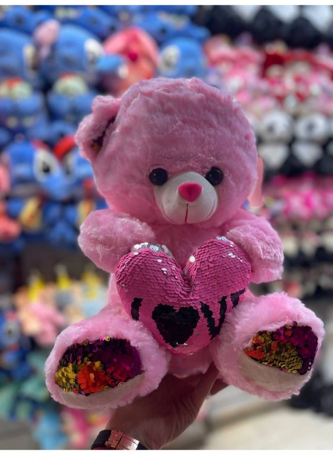 Express love and affection with this adorable teddy bear holding a heart. A perfect gift for special occasions like Valentine's Day, anniversaries, or to simply show someone you care. 