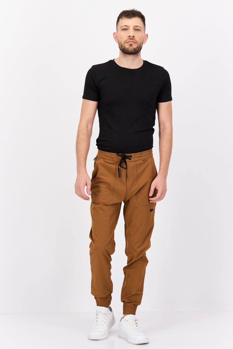 Hurley Men Straight Fit Brand Logo Training Pants, Tan  - Image 4