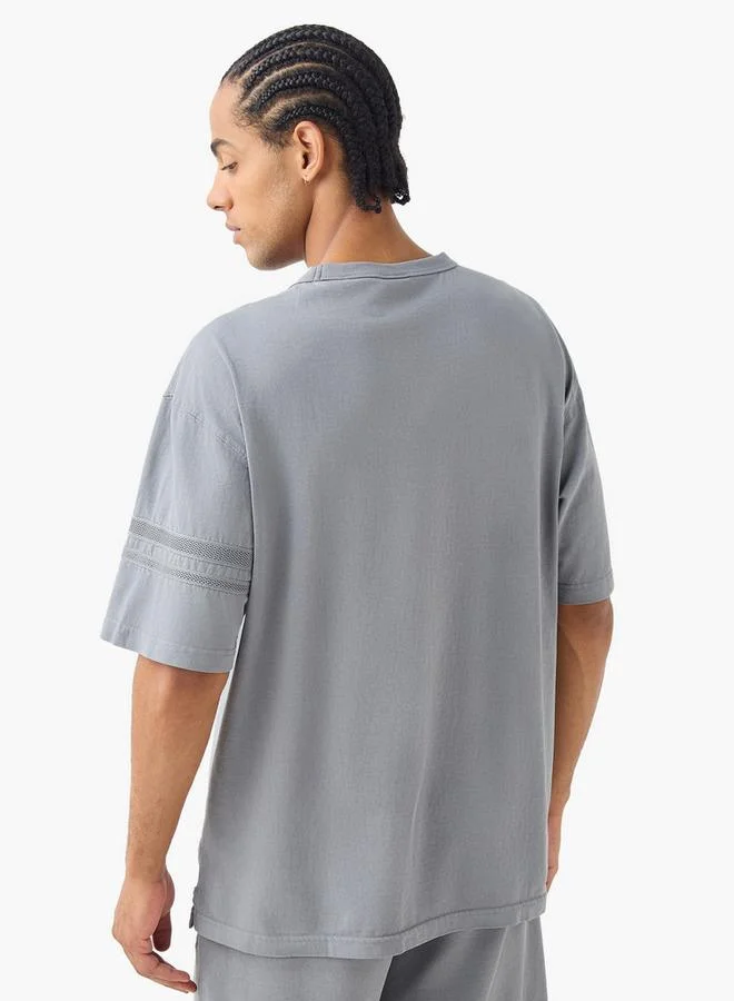 Kappa  Kappa Oversized T-shirt for Men | Best Price UAE