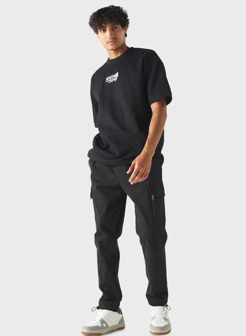 اس بي كاركترز Stranger Things Print Crew Neck T-Shirt