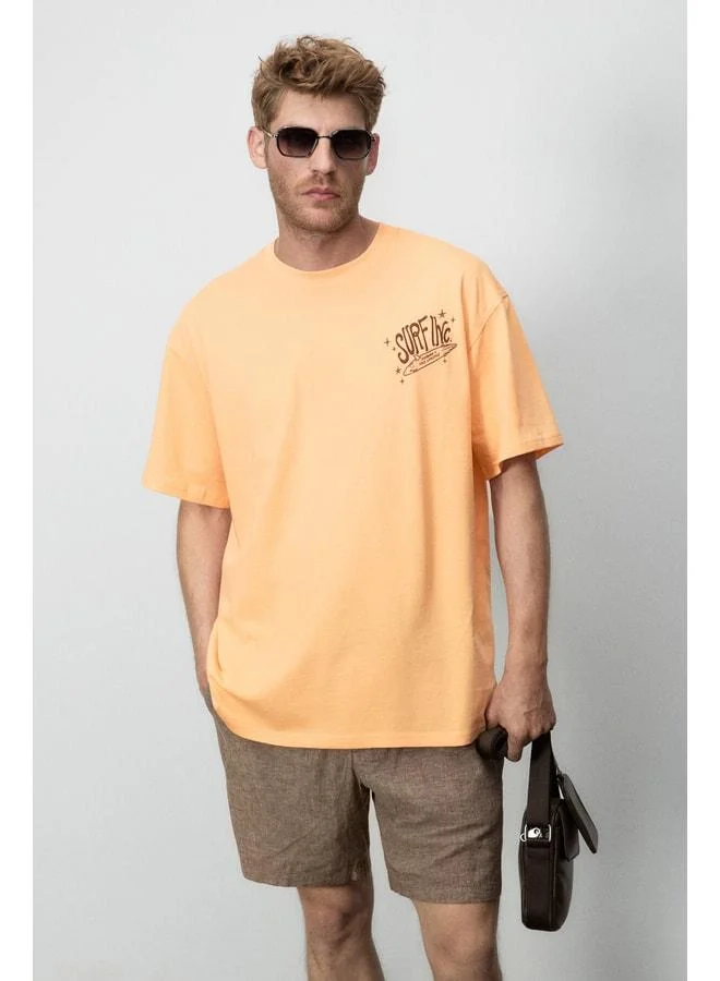 GRIMELANGE ALONZO Men's Oversize Fit 100% Cotton Embroidered and Printed Orange T-Shirt.