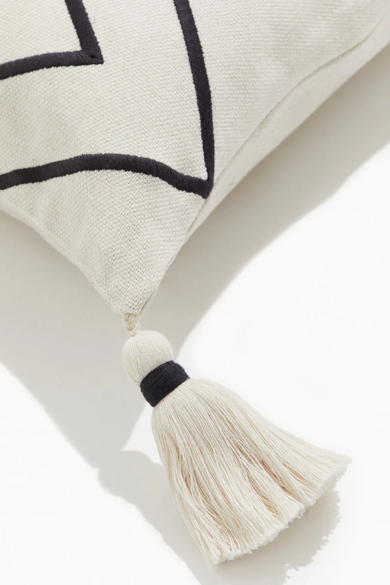 H&M Tasselled cushion cover