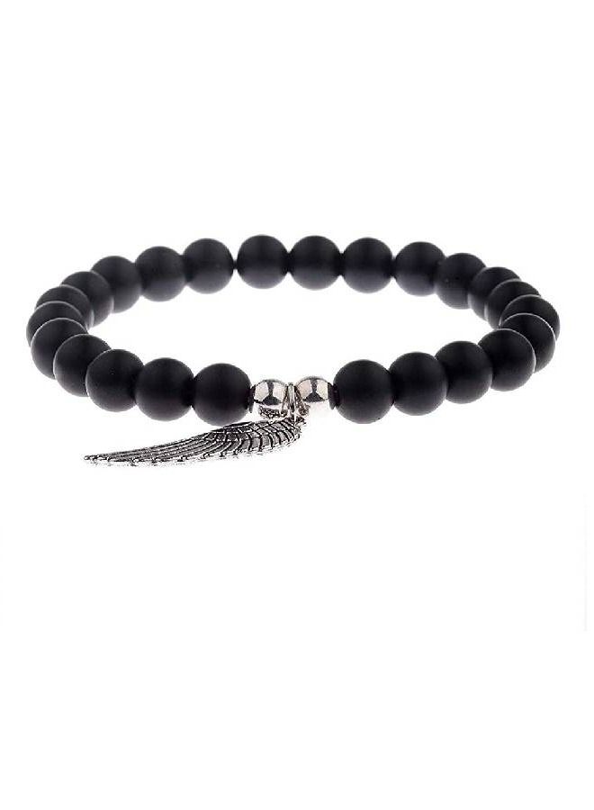 black bracelet with silver wing