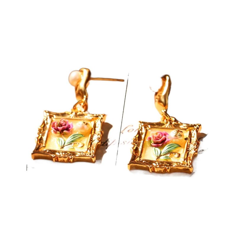 Gold Pearl Earrings with Flower Detail and Lightweight Huggie Profile for Daily Wear and Elegant Styling - NADI - Image 1