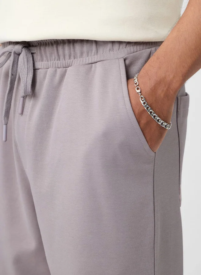 The Souled Store  The Souled Store Men Oversized Fit Solid Grey Joggers  | Best Price UAE