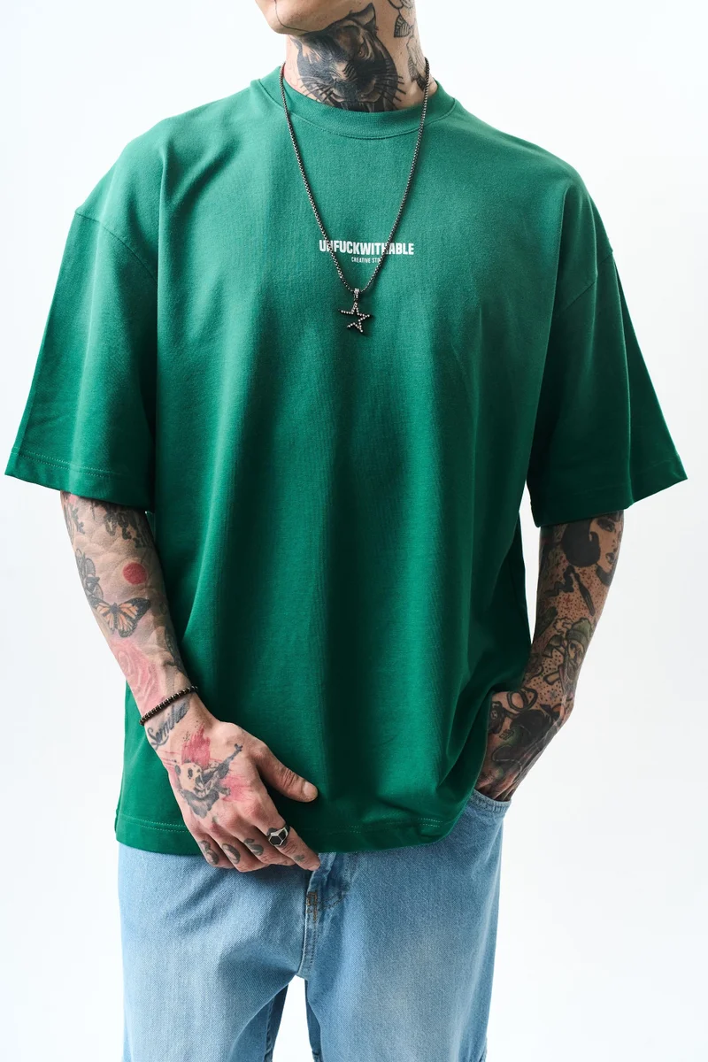 ريسباير تي شيرت رجالي مقاس كبير (Oversize) بطبعة "Unfuckwithable"، زيتي (نيفتي)