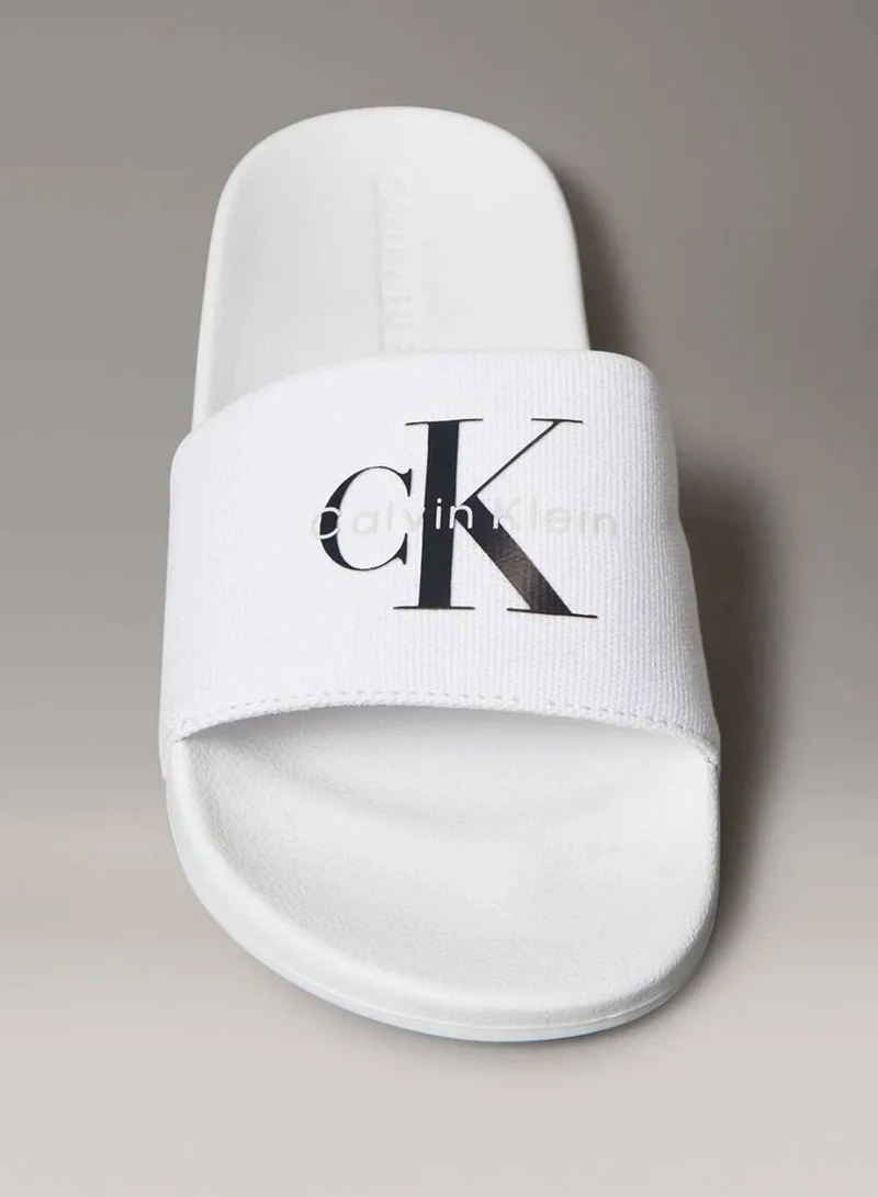 Calvin Klein Jeans Bright White/Black Canvas Logo Sliders for Women | Best Price UAE