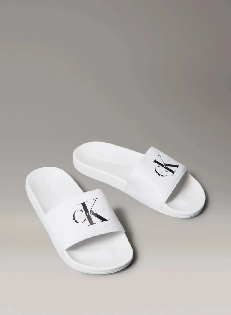 Calvin Klein Jeans Bright White/Black Canvas Logo Sliders for Women | Best Price UAE