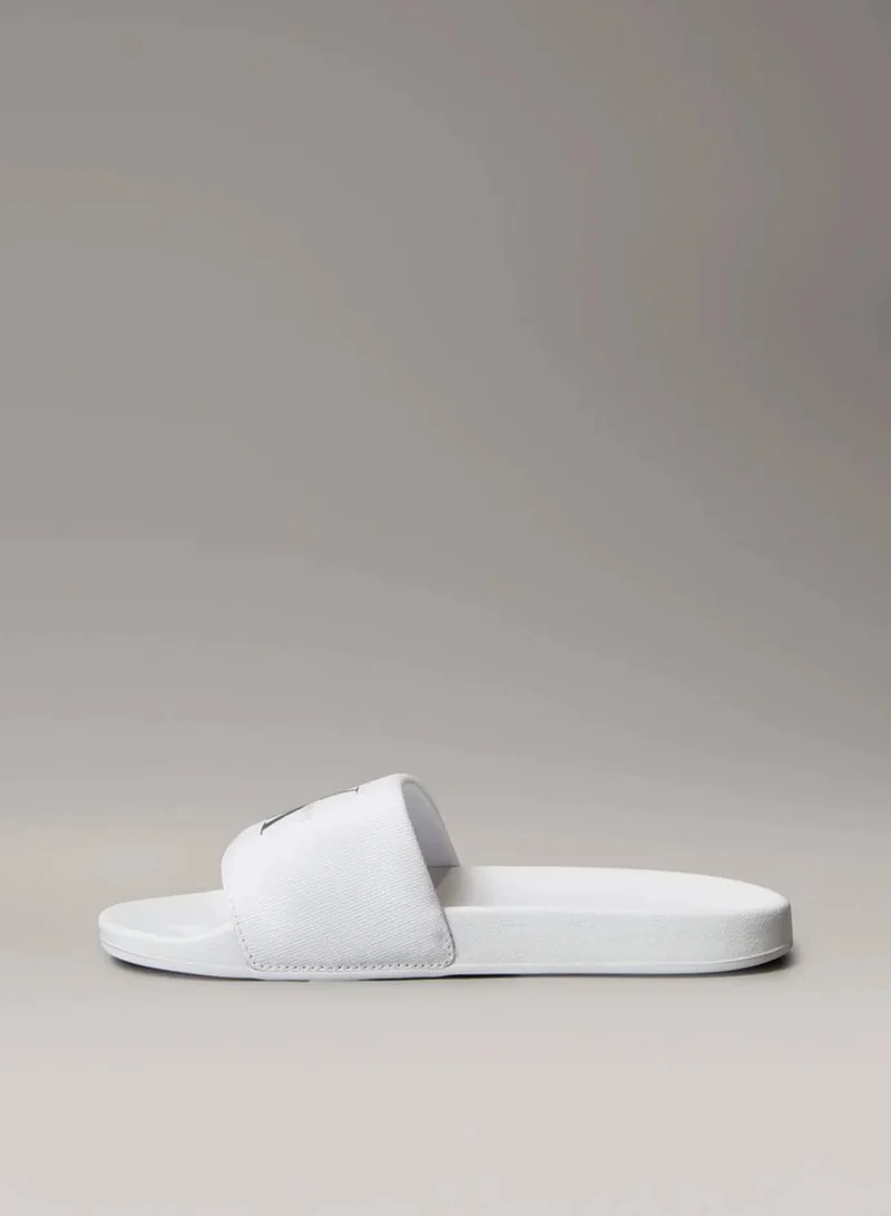 Calvin Klein Jeans Bright White/Black Canvas Logo Sliders for Women | Best Price UAE
