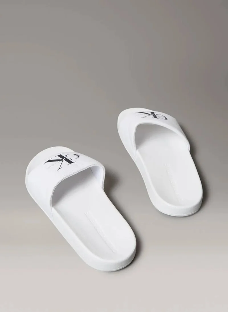 Calvin Klein Jeans Bright White/Black Canvas Logo Sliders for Women | Best Price UAE