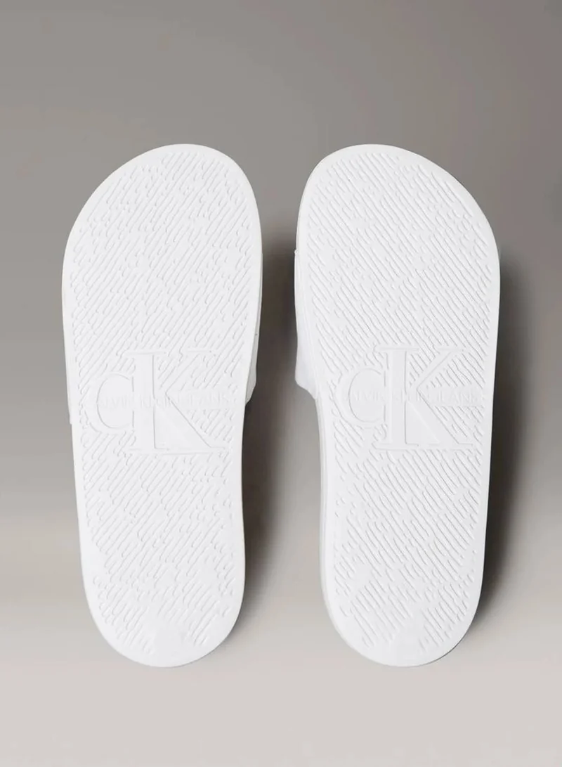 Calvin Klein Jeans Bright White/Black Canvas Logo Sliders for Women | Best Price UAE
