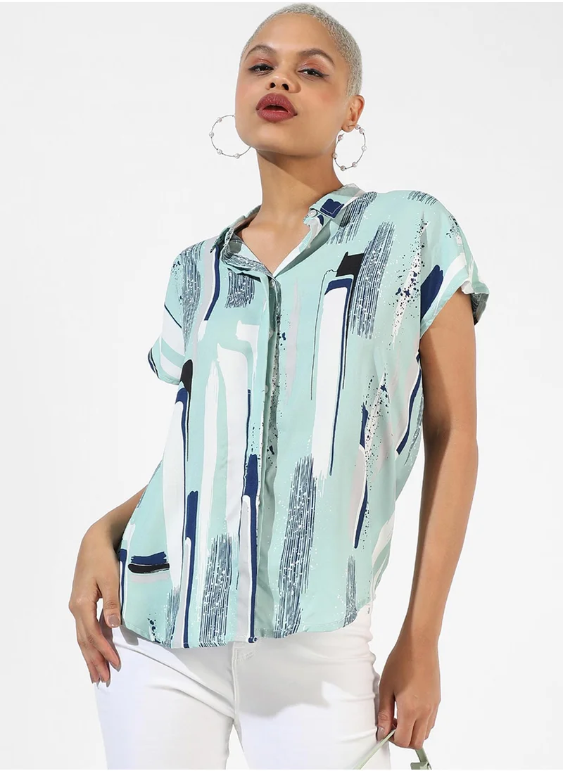 كامبوس سوترا Campus Sutra Women's Sage Green Printed Regular Fit Top For Casual Wear | Spread Collar | Short Sleeve | Top Crafted With Regular Sleeve, Comfort Fit & High-Performance For Everyday Wear
